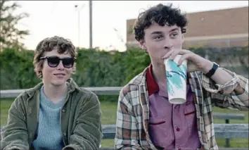  ?? Netflix ?? Ironically cheering on the football team is just the sort of thing Sydney, portrayed by Sophia Lillis, and Stanley, played by Wyatt Oleff, do to relax after school.