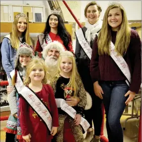  ?? TIMES photograph by Annette Beard ?? Visiting Santa after the parade were Miss Pea Ridge 2018 MaKenzie Shirley (who is also Miss Benton County 2018) and other Pea Ridge pageant winners: Pre-teen Miss Pea Ridge Kayleigh Mathis, Jr. Teen Miss Pea Ridge Raegan Grace Bleything and Miss Pea Ridge Claire Hale, and, front row, from left: Miss Pea Ridge Princess Paisley Tillman, Little Miss Pea Ridge Macy Dyson and Miss Tiny Tot Addison See.