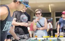  ??  ?? The Vancouver Craft Beer Week Festival includes games like foosball.