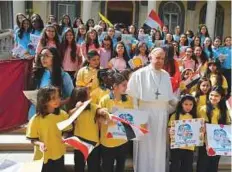  ?? AFP ?? Pope Francis meeting children at Cairo’s nunciature yesterday as part of a two-day visit to Egypt.