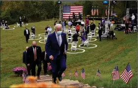  ?? (AP/Andrew Harnik) ?? Former Vice President Joe Biden leaves a socially distanced campaign stop in Warm Springs, Ga., where FDR sought respite from the polio he suffered. “I’m here to tell you we can and will get control of this virus,” Biden said. “As president, I will never wave the white flag of surrender.”