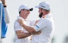  ?? USA TODAY SPORTS ?? Shane Lowry, right, hugs Rory McIlroy after winning the Zurich Classic of New Orleans golf tournament.