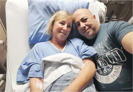  ??  ?? Annette and Marcel Poitras pose for a photo in hospital, where Annette has been recovering from injuries she sustained on Burke Mountain.