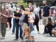  ?? Ned Gerard / Hearst Connecticu­t Media ?? Ella Aufiero hugs her mother, Gia, at the end of the first day of school Monday at Holy Trinity Catholic Academy in Shelton.