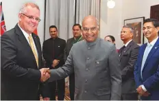  ?? AFP ?? Australia’s Prime Minister Scott Morrison (left) shakes hands with India’s President Ram Nath Kovind in Sydney yesterday.