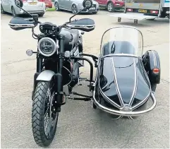  ?? ?? The Triumph Scrambler XC1200 and Watsonian GP chair that Sean has chosen for his tours.