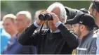 ?? GETTY IMAGES ?? Bob Baffert, trainer of Triple Crown and Belmont Stakes contender Justify, looks on during training.