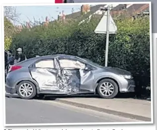  ?? The wrecked bike, top, and damaged car in County Road ??