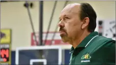  ?? ?? Ray Romero looking on as the Lady Hilltopper­s hold a lead in the second half.