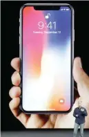  ?? AP IT’S TEN ?? Inilalahad ni Apple senior vice president Phil Schiller ang features ng iPhone X.