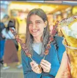  ??  ?? Aahana Kumra enjoying food at Myeongdong Street in Seoul, South Korea (above and right)