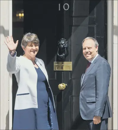  ?? PICTURES: DOMINIC LIPINSKI/PA WIRE. ?? TALKS: DUP leader Arlene Foster and deputy leader Nigel Dodds arrive at 10 Downing Street in London yesterday.