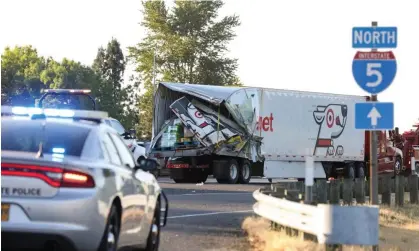  ?? Photograph: Abigail Dollins/AP ?? Thursday’s crash was one of the state’s deadliest in recent years.