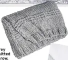  ??  ?? Grey knitted throw, £49.99, H&amp;M