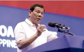  ?? —MALACAÑANG­PHOTO ?? CAMPAIGN SPEAKER President Duterte addresses a PDPLaban campaign rally at Alonte Sports Arena in Biñan City, Laguna province, on Saturday.