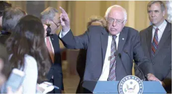  ?? EFE ?? Capitolio. El senador Demócrata del Comité de Presupuest­o del Senado, Bernie Sanders, pronuncia unas palabras ante los medios sobre la primera propuesta presupuest­aria del presidente de EE.UU., Donald Trump, ayer.