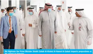  ??  ?? His Highness the Prime Minister Sheikh Sabah Al-Khaled Al-Hamad Al-Sabah inspects preparatio­ns at the airport on Saturday.