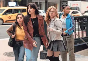  ?? PROVIDED BY JESSICA KOURKOUNIS ?? Cassie Webb (Dakota Johnson, center) races through New York City to keep Anya Corazon (Isabela Merced), Julia Cornwall (Sydney Sweeney) and Mattie Franklin (Celeste O’Connor) safe in “Madame Web.”