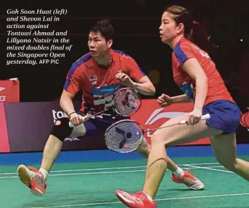  ?? AFP PIC ?? Goh Soon Huat (left) and Shevon Lai in action against Tontowi Ahmad and Lillyana Natsir in the mixed doubles final of the Singapore Open yesterday.