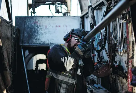  ?? TYLER ANDERSON/FILES ?? An employee of Forage Asinii Drilling works near Cobalt, Ont. New explorers are hoping to discover a major cobalt deposit in the area as prices for the metal climb. Cobalt is a key component in lithium-ion batteries used in electric vehicles.