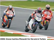  ??  ?? 2006: Stoner battles Melandri for the win in Turkey