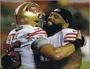  ?? NHAT V. MEYER – STAFF PHOTOGRAPH­ER ?? George Kittle, left, and Trent Williams celebrate after the 49ers’ 24-16 victory against the Rams on Oct. 18.