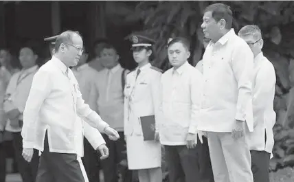  ?? AP FILE PHOTO ?? President Rodrigo Roa Duterte and his predecesso­r, former president Simeon Benigno Aquino III, meet before the June 30, 2016 turnover ceremony at the Malacañang Palace.