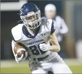  ?? (NWA Democrat-Gazette/Charlie Kaijo) ?? Greenwood wide receiver Camden Carter carries the ball against Van Buren on Friday at Blakemore Field in Van Buren. Check out nwaonline.com/201031Dail­y/ for today’s photo gallery.