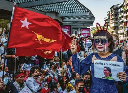  ?? Getty Images ?? Protests erupt in Myanmar on Wednesday, when President Joe Biden ordered new sanctions against the military regime.