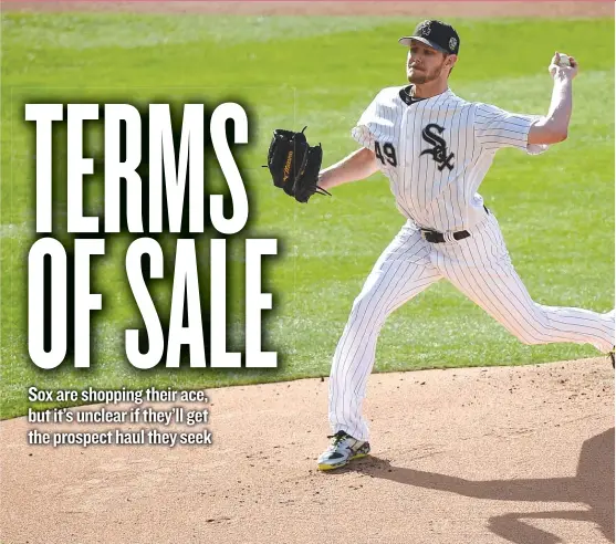  ?? | DENIS POROY/ GETTY IMAGES ?? Chris Sale ( pitching in the first inning of the All- Star Game in July) is contracted to make just $ 39 million over the next three years — a steal for a proven ace.