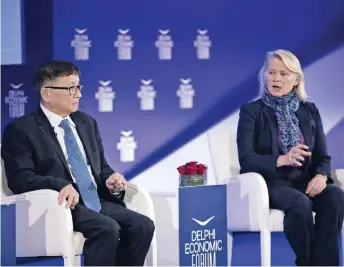  ?? ?? Susan Thornton (r), senior fellow at Yale University Law School’s Paul Tsai China Center, and Cheng Li, director of the John L. Thornton China Center and a senior fellow in the Foreign Policy program at Brookings, at the 7th Delphi Economic Forum on April 7.