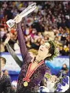  ??  ?? Gold medalist Yuzuru Hanyu of Japan acknowledg­es the crowd at a victory ceremony after the men’s free skating program during the ISU Grand Prix of Figure Skating in Sapporo, northern Japan on Nov
23. (AP)