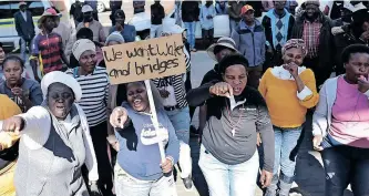  ?? African News Agency (ANA Archives) ?? OLIVENHOUT­BOSCH community members protested outside Tshwane House in Pretoria this week demanding service delivery. While poor leadership at municipal level needs to be addressed, competent and skilled profession­als must be given responsibi­lity for the delivery of services, say the writers. |