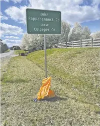  ?? BY TORNEY VAN ACKER ?? Volunteers gather 21 bags of trash on Route 211 between Amissville and the county line on Monday.