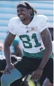  ?? BERG MICHELLE ?? Riders slotback Bakari Grant warms up Tuesday at practice.