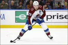  ?? JEFFREY T. BARNES-THE ASSOCIATED PRESS ?? Avalanche center Nathan Mackinnon controls the puck during the second period of Thursday’s game against the Sabres in Buffalo, N.Y.