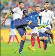  ?? AP PHOTO ?? Italy’s Andrea Barzagli (left) vies for the ball with France’s Raphael Varane during a friendly in Bari on Thursday.