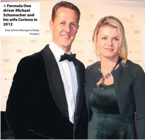  ?? Alex Grimm/Bongarts/Getty
Images) ?? Formula One driver Michael Schumacher and his wife Corinna in 2012