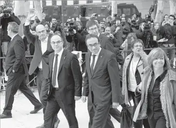  ?? Pablo Blazquez Dominguez Getty I mages ?? FORMER MEMBERS of the Catalan government arrive at federal court in Madrid to answer possible charges of rebellion. A professor in Seville said of independis­tas: “All day they are critical of the rest of Spain.”