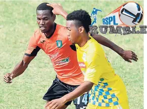  ?? FILE ?? Marvin Stewart of Tivoli Garden FC tries to stop Tyreek Magee (right) of Harbour View from advancing during their Red Stripe Premier League game at the Harbour View Stadium on Thursday, February 15.