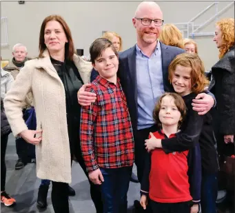  ??  ?? Stephen Donnelly with his children and wife Susan at last February’s General Election count.