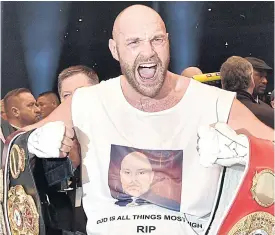  ??  ?? Tyson Fury celebrates after beating Wladimir Klitschko.