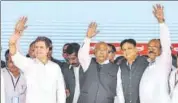  ?? PTI ?? Congress president Rahul Gandhi with senior party leader Mallikarju­n Kharge and others, during a public rally in Kalaburagi, Karnataka, on Monday.