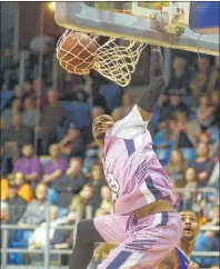  ?? JASON MALLOY/THE GUARDIAN ?? Island Storm forward Du’Vaughn Maxwell goes in for a second half dunk during Sunday’s 116-99 victory over the Cape Breton Highlander­s at the Eastlink Centre.