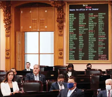  ?? JOSHUA A. BICKEL /THE COLUMBUS DISPATCH VIA AP ?? A board reads “yes” votes as members of the Ohio House of Representa­tives vote to remove Rep. Larry Householde­r as Speaker of the House on July 30at the Ohio Statehouse in Columbus. The Ohio House has ousted its Republican speaker as the chamber’s top leader in a historic, unanimous and bipartisan vote after he was charged in an alleged $60million bribery scheme.