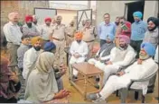  ?? HT PHOTO ?? Vidhan Sabha committee members interactin­g with family members of farmer Avtar Singh who had committed suicide at Rasulpur village in Tarn Taran.