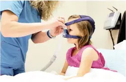  ??  ?? CURE?: Tonsilecto­my is considered a cure for children who often get sore throats, but researcher­s say it may increase the risk of respirator­y infections.