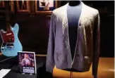  ??  ?? Kurt Cobain’s cardigan from Nirvana’s 1993 MTV Unplugged performanc­e is on display at the Hard Rock Cafe in New York City ahead of the auction of Julien’s Auctions in New York City.