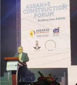  ??  ?? DTI Secretary Lopez speaking at the first ever ASEAN +6 Constructi­on Forum.
