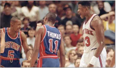  ?? (AP file photo) ?? Darrell Walker (left) played the 1991-1992 season with the Detroit Pistons alongside longtime friend Isiah Thomas (11). As documented in ESPN’s The Last Dance, the Pistons were a fierce rival of the Michael Jordan-led Chicago Bulls.